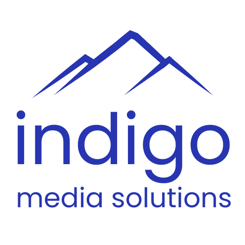 The word indigo in large, blue, lowercase letter with the words "media solutions" under it in smaller lowercase blue letters. All words are below a minimalist design of three blue mountains.